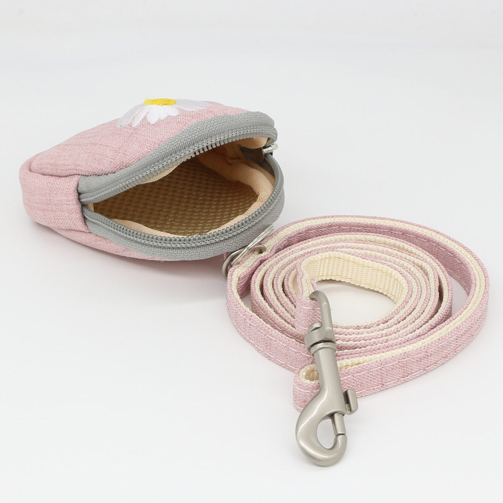 Its a harness, but more. Small/Medium dogs will love this adjustable Set w/leash. Snack bag included and adorable.